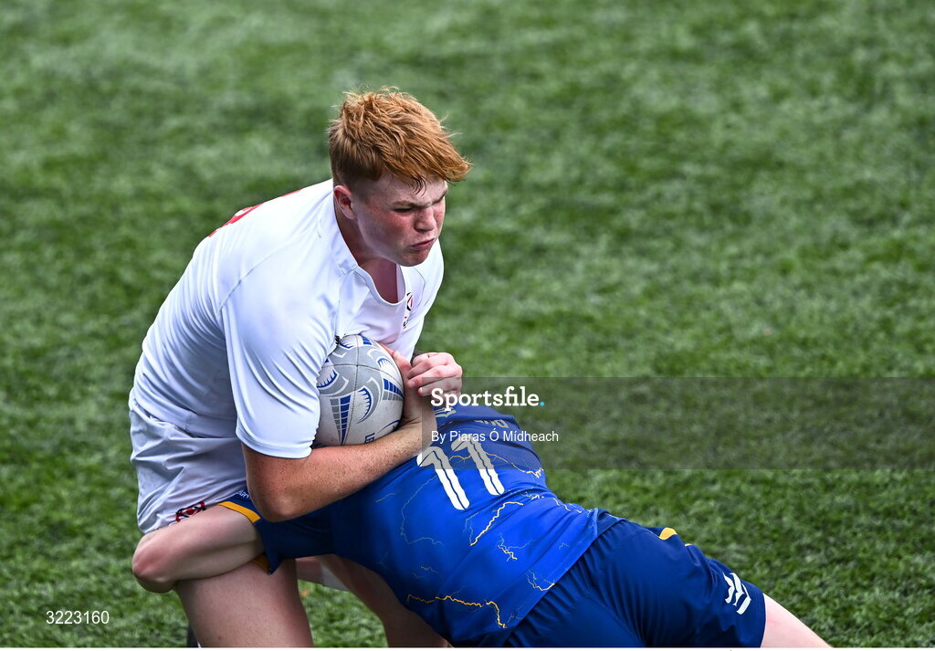 27 August 2025; Josh McCaughney of Ulster is tackled by Tommy Smyth of Leinster during the PwC U-18 Boys Schools Interprovincial Series match between Leinster and Ulster at Energia Park in Dublin. Photo by Piaras Ó Mídheach/Sportsfile