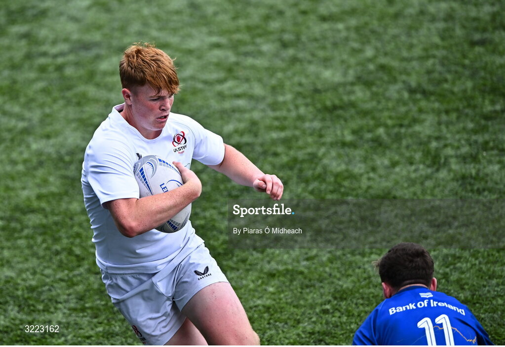 27 August 2025; Josh McCaughney of Ulster is tackled by Tommy Smyth of Leinster during the PwC U-18 Boys Schools Interprovincial Series match between Leinster and Ulster at Energia Park in Dublin. Photo by Piaras Ó Mídheach/Sportsfile