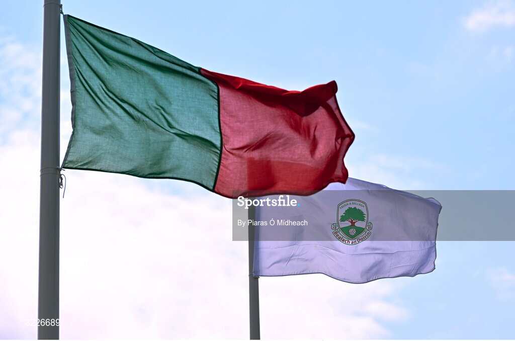 24 August 2025; The Ballaghaderreen flag, right, and the Mayo GAA flying before the Mayo County Senior Club Football Championship Round 2 match between Charlestown Sarsfields and Ballaghaderreen at Fr O'Hara Park in Charlestown, Mayo. Photo by Piaras Ó Mídheach/Sportsfile