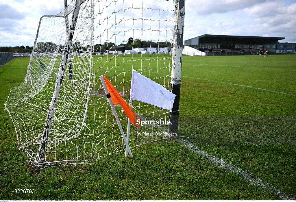 24 August 2025; An umpire's orange and white flags in place before the Mayo County Senior Club Football Championship Round 2 match between Charlestown Sarsfields and Ballaghaderreen at Fr O'Hara Park in Charlestown, Mayo. Photo by Piaras Ó Mídheach/Sportsfile