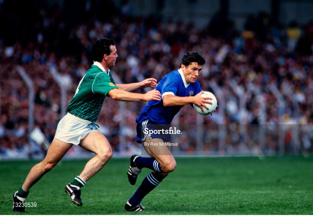 24 August 1986; Ger Power of Kerry in action against Mick Lyons of Meath during the GAA All-Ireland Senior Football Championship semi-final match between Meath and Kerry at Croke Park in Dublin. Photo by Ray McManus/Sportsfile