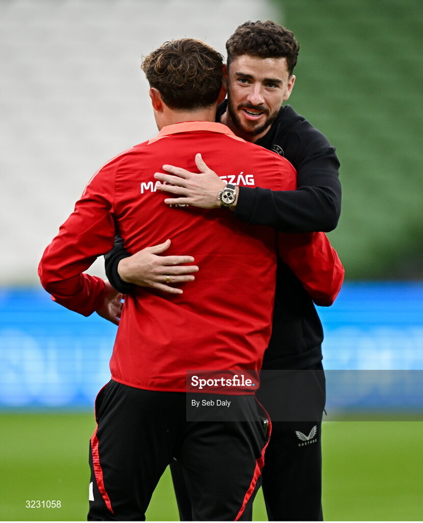 6 September 2025; Mikey Johnston of Republic of Ireland, right, and Callum Styles of Hungary before the FIFA World Cup 2026 Group F qualifying match between Republic of Ireland and Hungary at the Aviva Stadium in Dublin. Photo by Seb Daly/Sportsfile