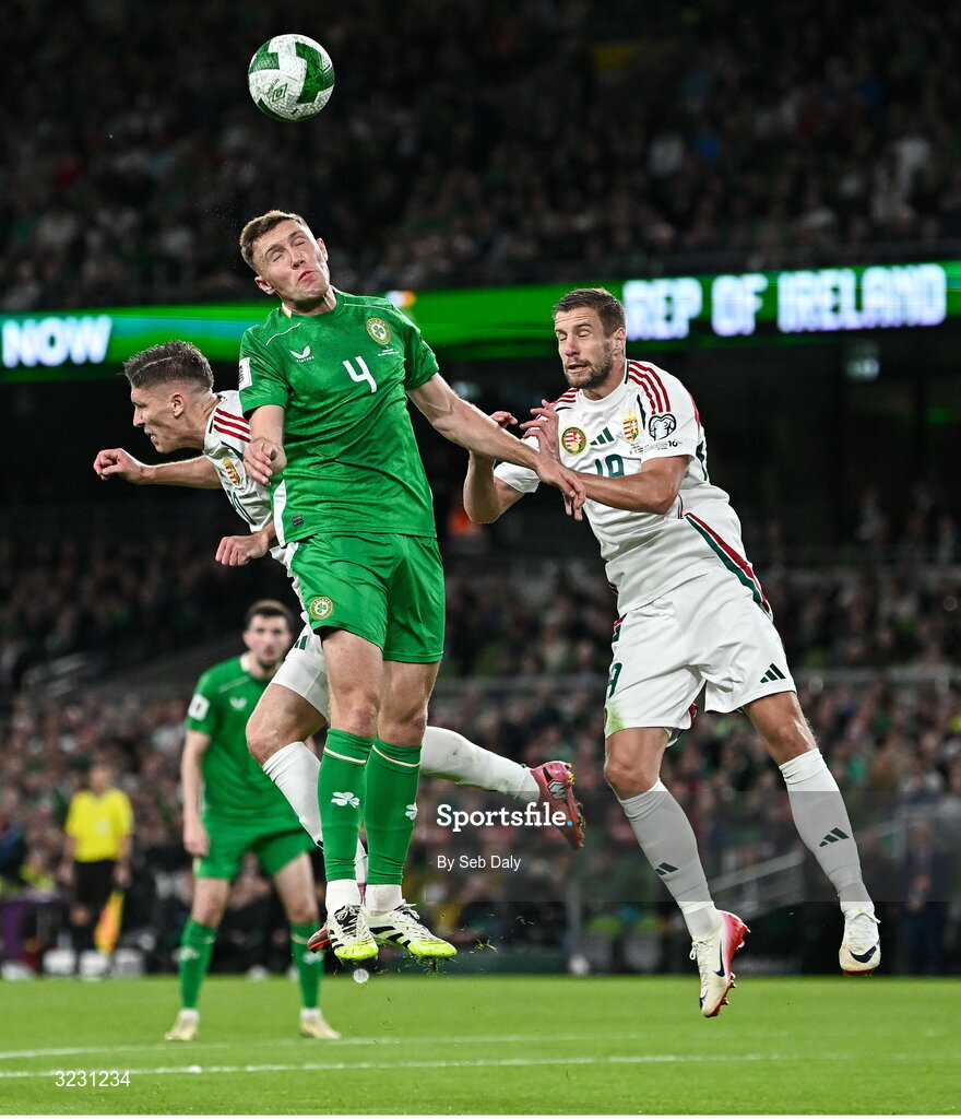 6 September 2025; Dara O'Shea of Republic of Ireland in action against Hungary players Roland Sallai, left, and Barnabás Varga during the FIFA World Cup 2026 Group F qualifying match between Republic of Ireland and Hungary at the Aviva Stadium in Dublin. Photo by Seb Daly/Sportsfile