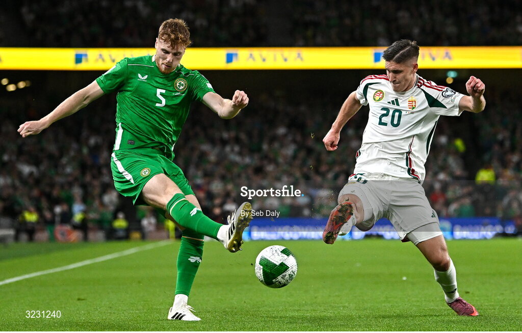 6 September 2025; Jake O'Brien of Republic of Ireland in action against Roland Sallai of Hungary during the FIFA World Cup 2026 Group F qualifying match between Republic of Ireland and Hungary at the Aviva Stadium in Dublin. Photo by Seb Daly/Sportsfile