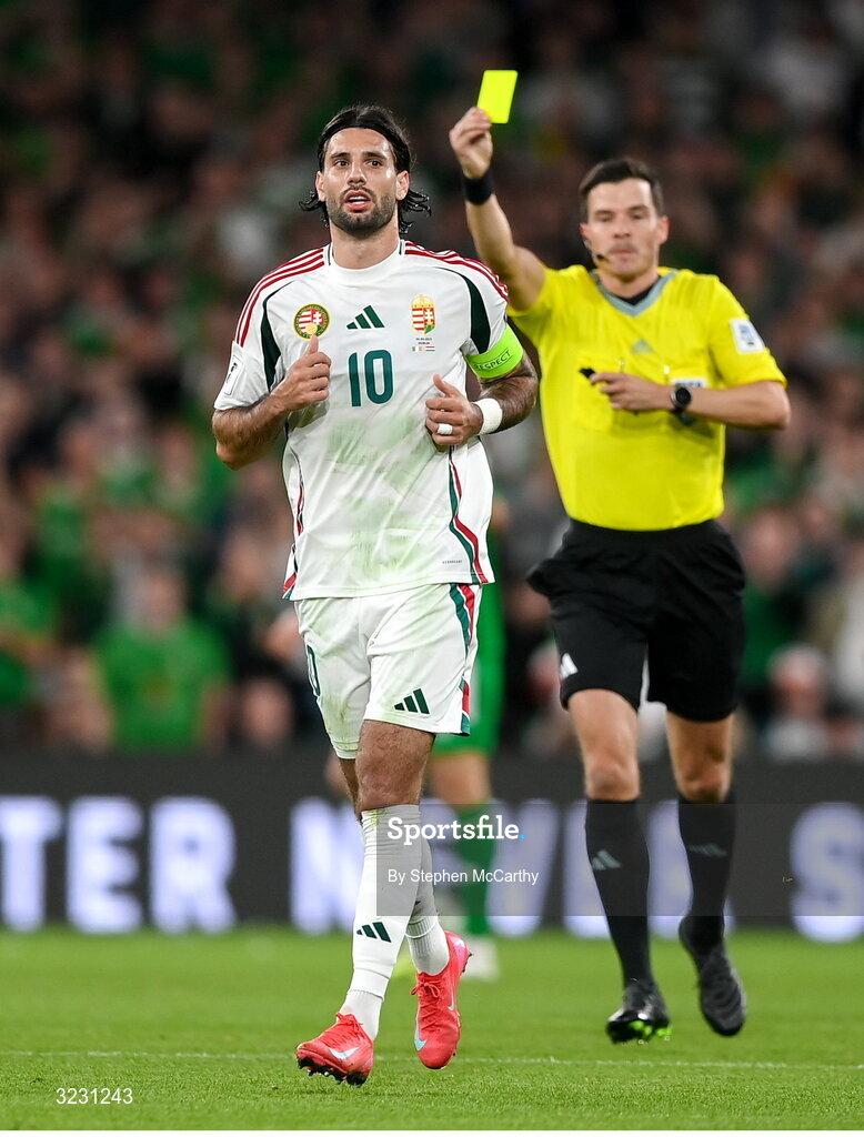 6 September 2025; Dominik Szoboszlai of Hungary is shown a yellow card by referee Harm Osmer during the FIFA World Cup 2026 Group F qualifying match between Republic of Ireland and Hungary at the Aviva Stadium in Dublin. Photo by Stephen McCarthy/Sportsfile