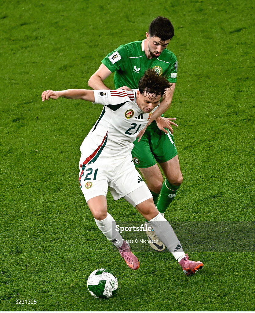 6 September 2025; Alex Tóth of Hungary in action against Finn Azaz of Republic of Ireland during the FIFA World Cup 2026 Group F qualifying match between Republic of Ireland and Hungary at the Aviva Stadium in Dublin. Photo by Piaras Ó Mídheach/Sportsfile