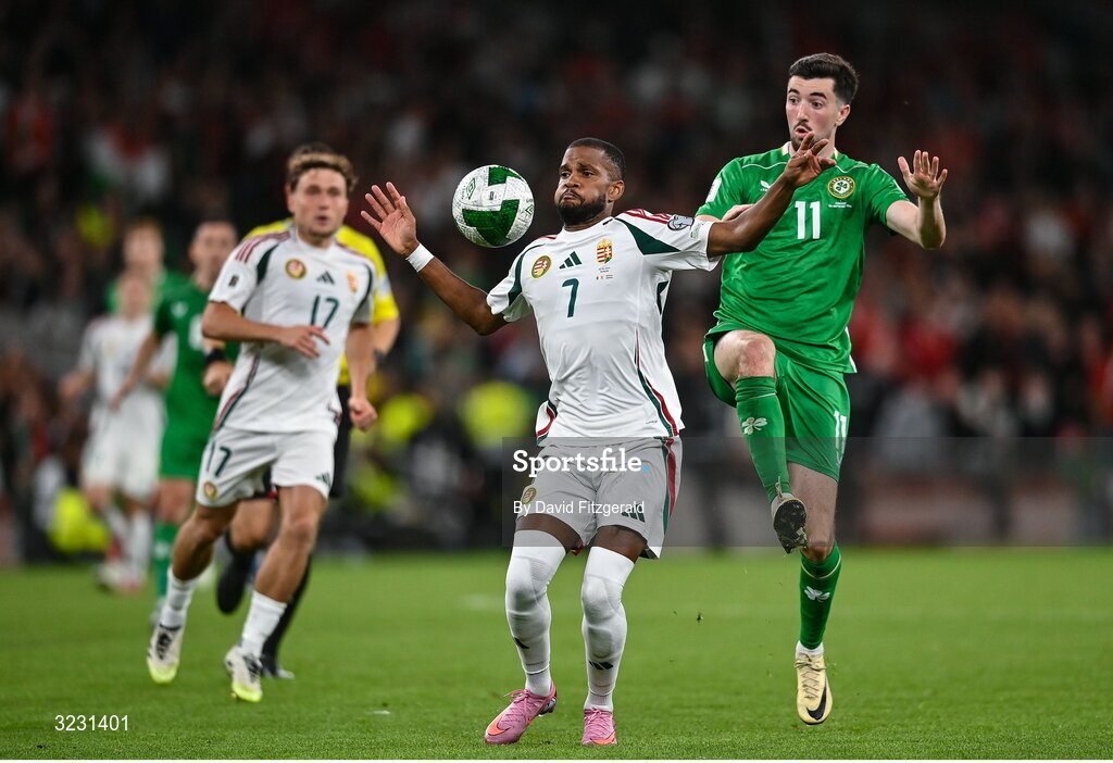 6 September 2025; Loic Nego of Hungary in action against Finn Azaz of Republic of Ireland during the FIFA World Cup 2026 Group F qualifying match between Republic of Ireland and Hungary at the Aviva Stadium in Dublin. Photo by David Fitzgerald/Sportsfile