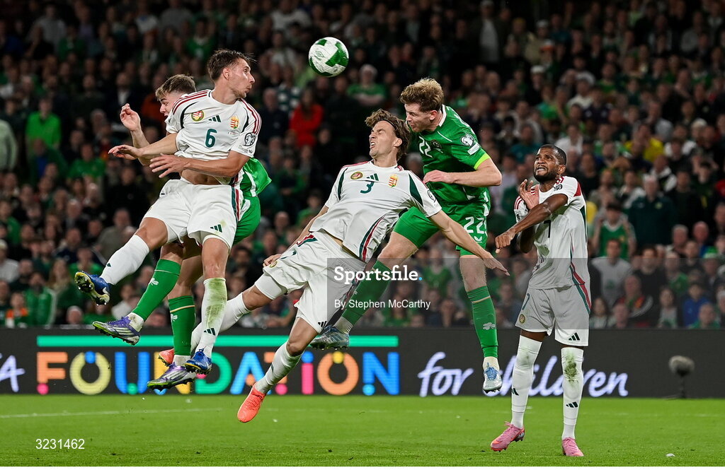 6 September 2025; Nathan Collins of Republic of Ireland in action against Attila Mocsi of Hungary during the FIFA World Cup 2026 Group F qualifying match between Republic of Ireland and Hungary at the Aviva Stadium in Dublin. Photo by Stephen McCarthy/Sportsfile