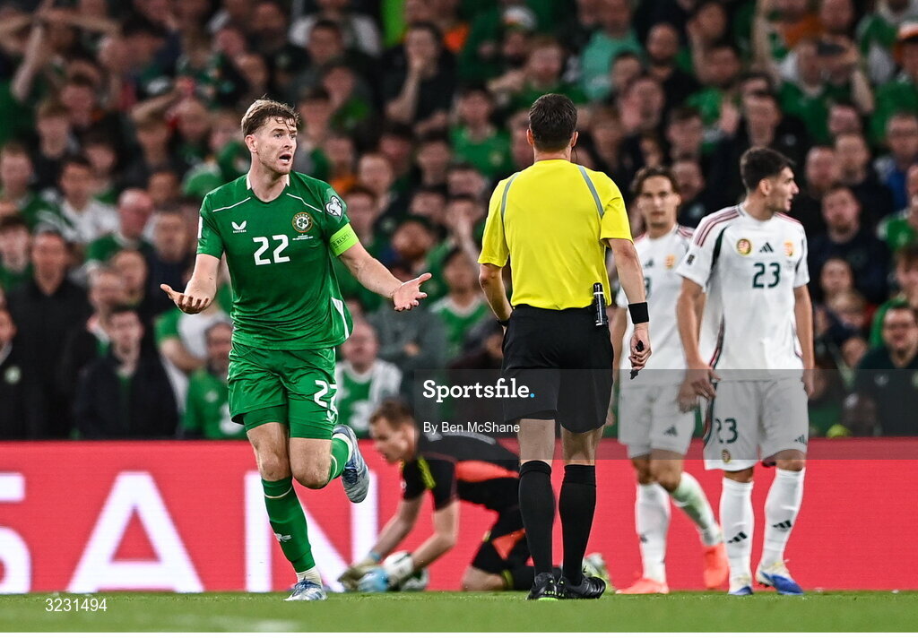 6 September 2025; Nathan Collins of Republic of Ireland appleals to referee Harm Osmer for a penalty during the FIFA World Cup 2026 Group F qualifying match between Republic of Ireland and Hungary at the Aviva Stadium in Dublin. Photo by Ben McShane/Sportsfile