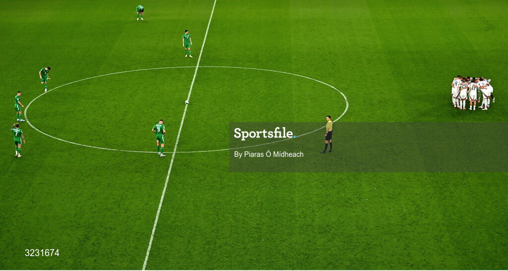 6 September 2025; Republic of Ireland players wait for Hungary to end their huddle to start the second half during the FIFA World Cup 2026 Group F qualifying match between Republic of Ireland and Hungary at the Aviva Stadium in Dublin. Photo by Piaras Ó Mídheach/Sportsfile