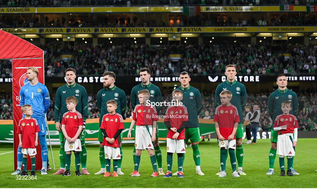 6 September 2025; Republic of Ireland players, from left, goalkeeper Caoimhin Kelleher, Matt Doherty, Ryan Manning, Finn Azaz, Jason Knight, Dara O'Shea and Josh Cullen stand for the playing of the National Anthems before the FIFA World Cup 2026 Group F qualifying match between Republic of Ireland and Hungary at the Aviva Stadium in Dublin. Photo by Stephen McCarthy/Sportsfile