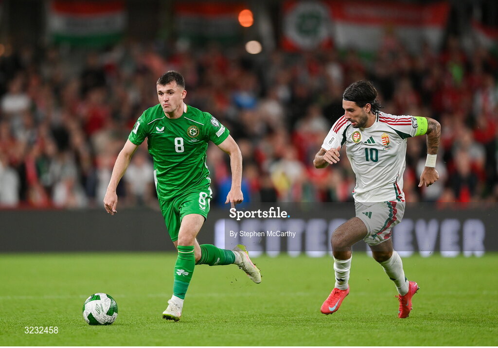 6 September 2025; Jason Knight of Republic of Ireland in action against Dominik Szoboszlai of Hungary during the FIFA World Cup 2026 Group F qualifying match between Republic of Ireland and Hungary at the Aviva Stadium in Dublin. Photo by Stephen McCarthy/Sportsfile