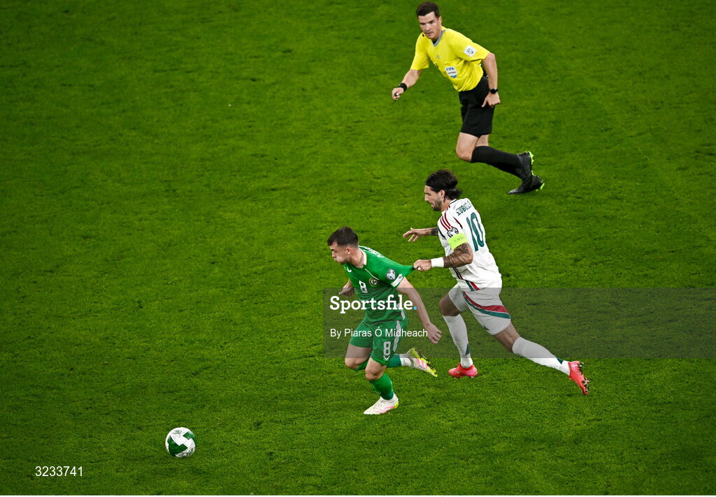 6 September 2025; Jason Knight of Republic of Ireland has his jersey pulled by Dominik Szoboszlai of Hungary during the FIFA World Cup 2026 Group F qualifying match between Republic of Ireland and Hungary at the Aviva Stadium in Dublin. Photo by Piaras Ó Mídheach/Sportsfile