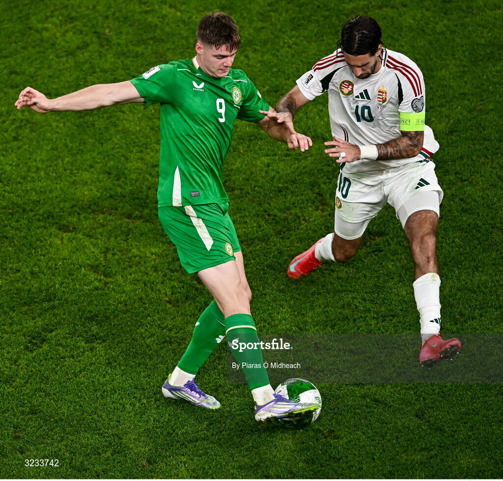 6 September 2025; Evan Ferguson of Republic of Ireland in action against Dominik Szoboszlai of Hungary during the FIFA World Cup 2026 Group F qualifying match between Republic of Ireland and Hungary at the Aviva Stadium in Dublin. Photo by Piaras Ó Mídheach/Sportsfile