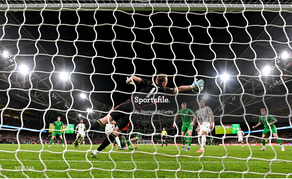 6 September 2025; Hungary goalkeeper Dénes Dibusz saves from Finn Azaz of Republic of Ireland during the FIFA World Cup 2026 Group F qualifying match between Republic of Ireland and Hungary at the Aviva Stadium in Dublin. Photo by Stephen McCarthy/Sportsfile