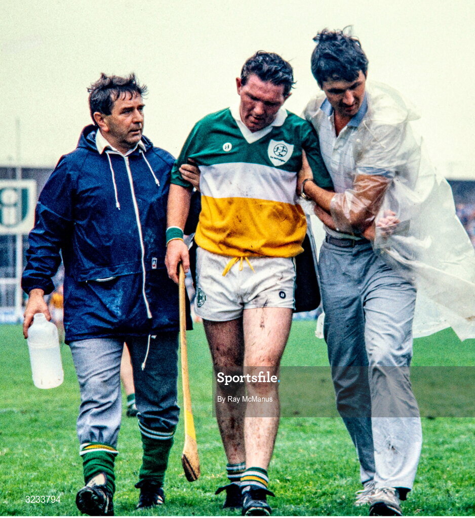 13 July 1986; Injured Offaly player Padraig Horan leaves the pitch during the GAA Leinster Senior Hurling Championship final match between Kilkenny and Offaly at Croke Park in Dublin. Photo by Ray McManus/Sportsfile