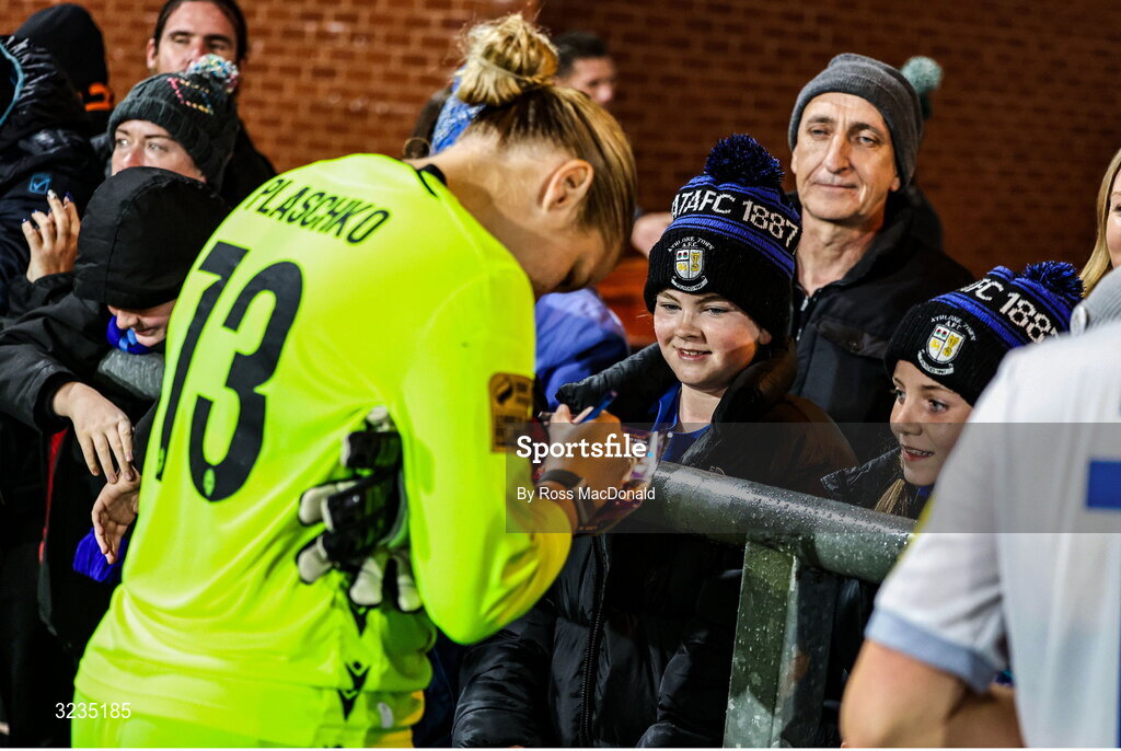 10 September 2025; Megan Plaschko of Athlone Town signs an autograph for a young fan at full time after the UEFA Women's Europa Cup first qualifying round first leg match between Glasgow City and Athlone Town at Petershill Park in Glasgow, Scotland. Photo by Ross MacDonald/Sportsfile