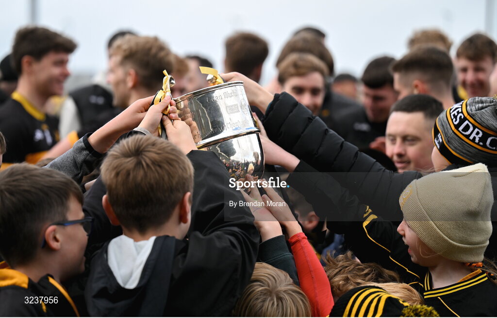 14 September 2025; Children from the Dr Crokes club celebrate with the Michael O'Connor cup after the Kerry County Senior Club Football Championship final match between Dr Crokes and Na Gaeil at Austin Stack Park in Tralee, Kerry. Photo by Brendan Moran/Sportsfile