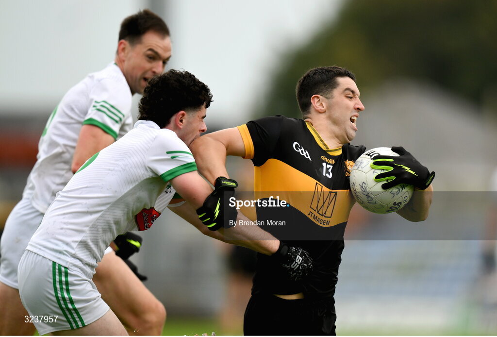 14 September 2025; Tony Brosnan of Dr Crokes is tackled by Jack Doyle of Na Gaeil  during the Kerry County Senior Club Football Championship final match between Dr Crokes and Na Gaeil at Austin Stack Park in Tralee, Kerry. Photo by Brendan Moran/Sportsfile