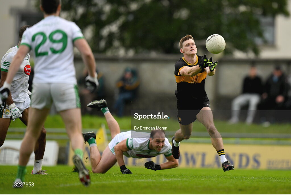 14 September 2025; Gavin White of Dr Crokes scores a point despite the efforts of Andrew Barry of Na Gaeil during the Kerry County Senior Club Football Championship final match between Dr Crokes and Na Gaeil at Austin Stack Park in Tralee, Kerry. Photo by Brendan Moran/Sportsfile