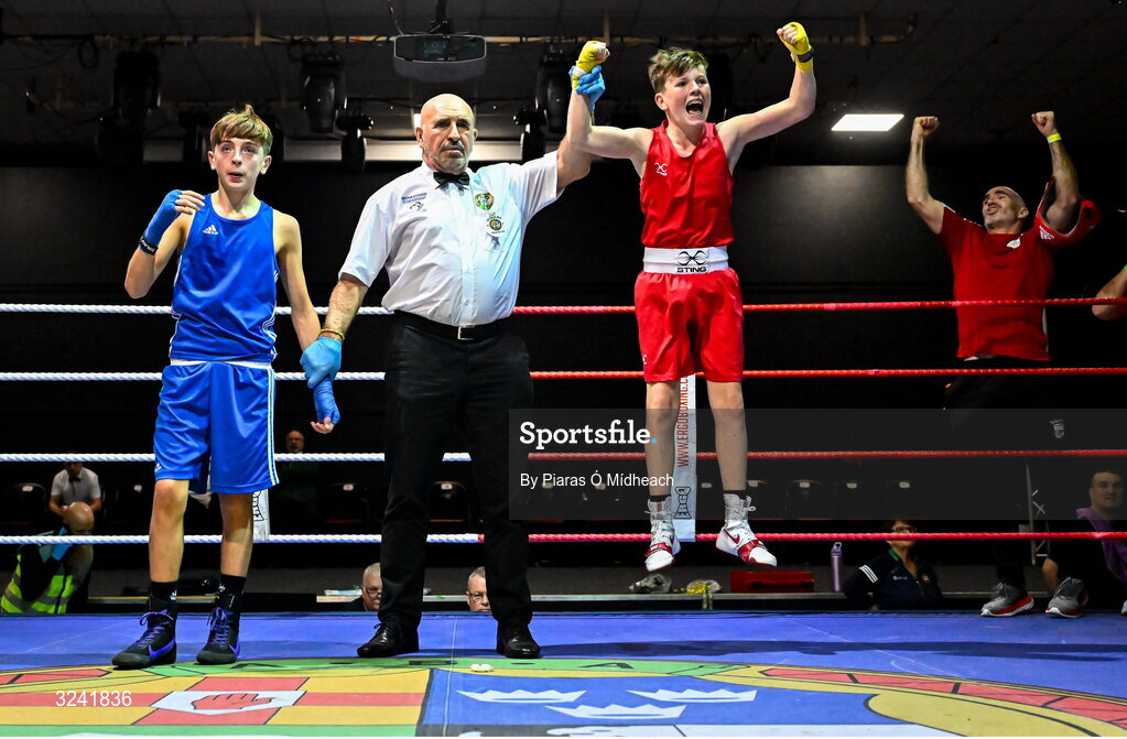 19 September 2025; Harry Reddington of Cherry Orchard BC Dublin, right, celebrates after defeating Jude Reilly of Immaculata ABC Belfast during their 42kg bout at the 2025 IABA National U17 Championship Finals at the National Boxing Stadium in Dublin. Photo by Piaras Ó Mídheach/Sportsfile
