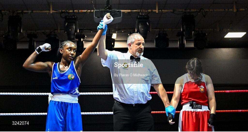 19 September 2025; Ruth Dossen Olympic BC Galway, left, celebrates after defeating Madina Bagirova of Smithfield BC Dublin during their 60kg bout at the 2025 IABA National U17 Championship Finals at the National Boxing Stadium in Dublin. Photo by Piaras Ó Mídheach/Sportsfile