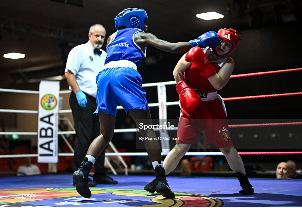 19 September 2025; Ruth Dossen Olympic BC Galway, left, in action against Madina Bagirova of Smithfield BC Dublin during their 60kg bout at the 2025 IABA National U17 Championship Finals at the National Boxing Stadium in Dublin. Photo by Piaras Ó Mídheach/Sportsfile
