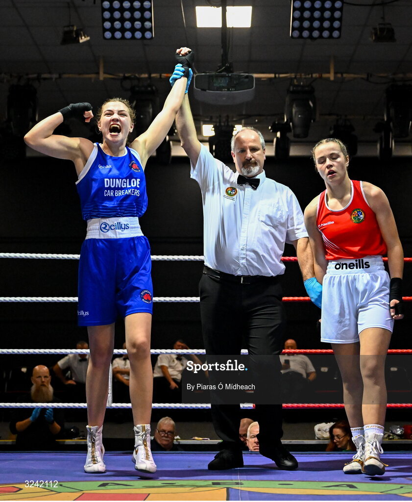 19 September 2025; Aleisha Mullis Boyle of Dungloe ABC Donegal, left, celebrates after defeating Grace Bailey of Castlebar BC Mayo during their 66kg bout at the 2025 IABA National U17 Championship Finals at the National Boxing Stadium in Dublin. Photo by Piaras Ó Mídheach/Sportsfile