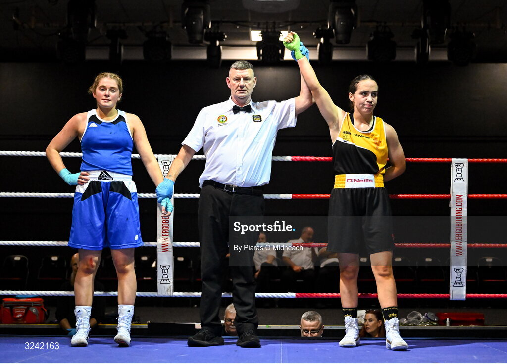 19 September 2025; Cassie Henderson of Phoenix ABC Antrim, right, celebrates after defeating Gianna Duffy of UNIT 3 BC Naas Kildare during their 70kg bout at the 2025 IABA National U17 Championship Finals at the National Boxing Stadium in Dublin. Photo by Piaras Ó Mídheach/Sportsfile