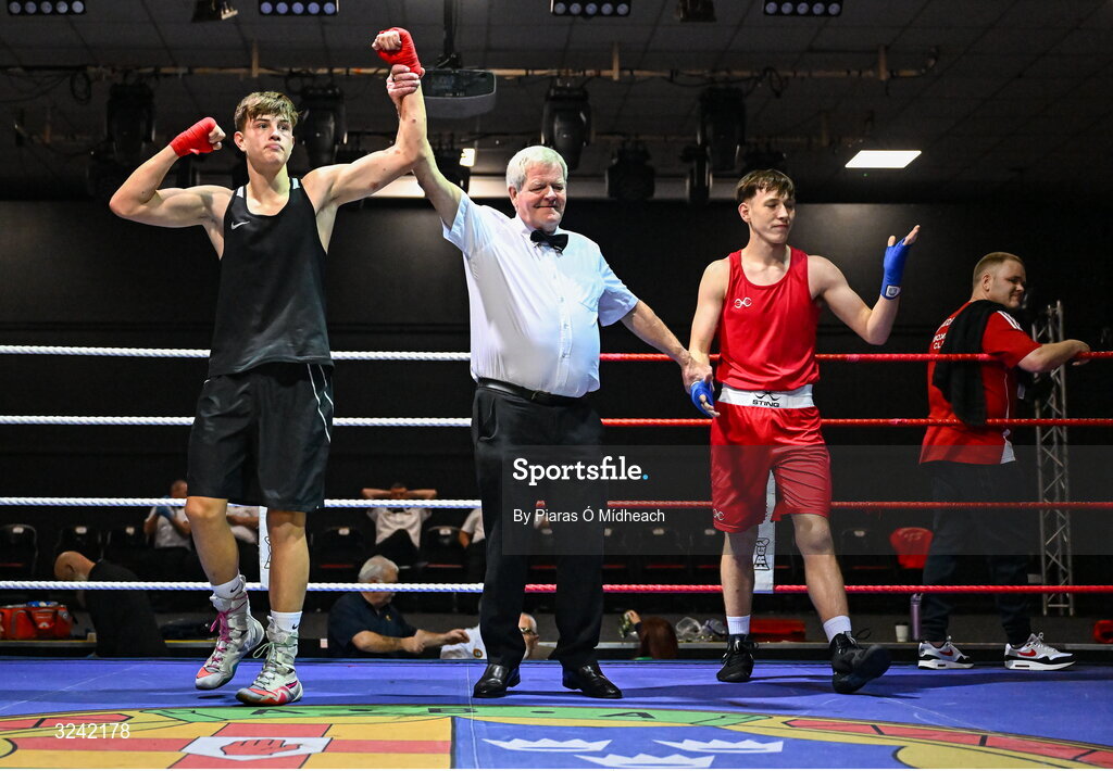 19 September 2025; Conor Dowds of Immaculata ABC Belfast, left, celebrates after defeating Hughie Lee Nevin of Sacred Heart BC Dublin during their 70kg bout at the 2025 IABA National U17 Championship Finals at the National Boxing Stadium in Dublin. Photo by Piaras Ó Mídheach/Sportsfile