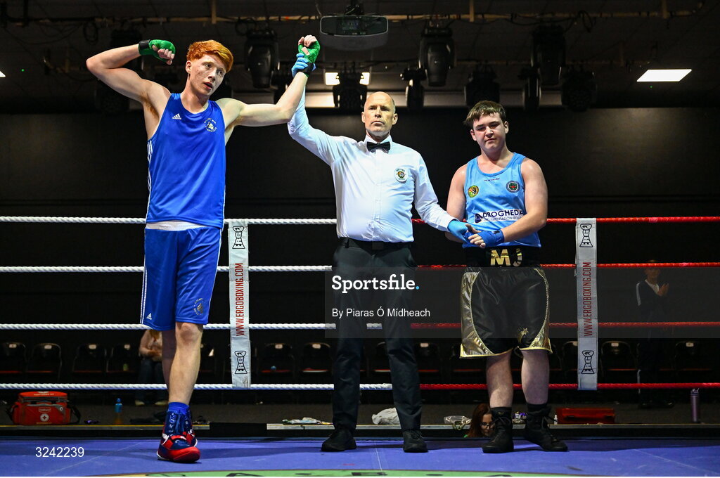 19 September 2025; William Heaphy of Golden Gloves BC Cork, left, celebrates after defeating Michael J McDonagh of Tredagh Boxing Academy Louth during their 80kg+ bout at the 2025 IABA National U17 Championship Finals at the National Boxing Stadium in Dublin. Photo by Piaras Ó Mídheach/Sportsfile