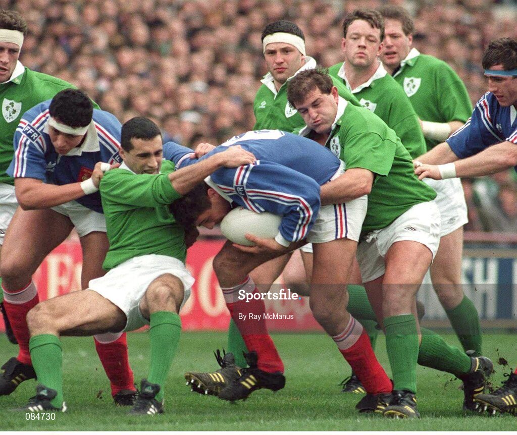 20 February 1993; Philippe Benetton, France, is tackled by Michael Bradley, left, and Peter Clohessy, Ireland. Five Nations Rugby Championship, Ireland v France, Lansdowne Road, Dublin. Picture credit: Ray McManus / SPORTSFILE