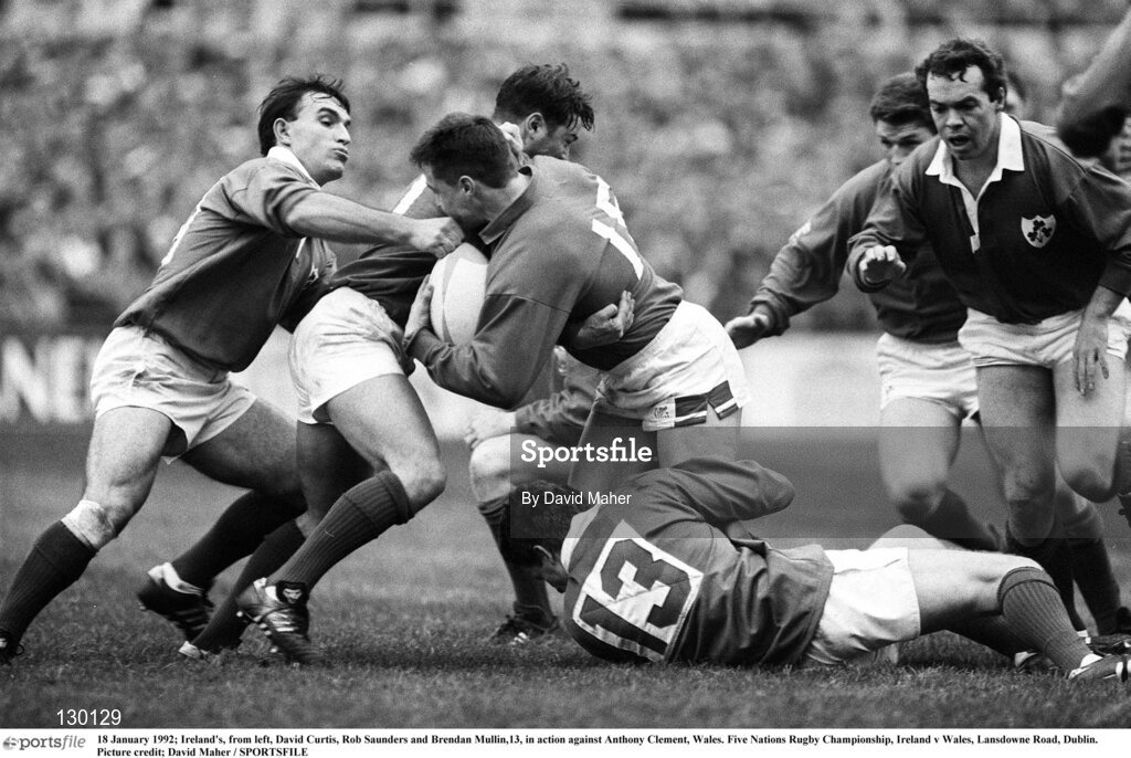 18 January 1992; Ireland players, from left, David Curtis, Rob Saunders and Brendan Mullin tackle Anthony Clement of Wales during the Five Nations Rugby Championship match between Ireland and Wales at Lansdowne Road in Dublin. Photo by David Maher/Sportsfile