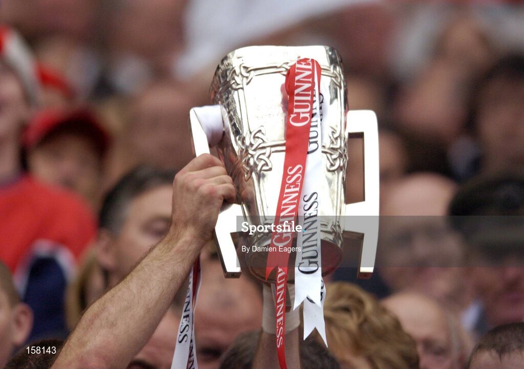 12 September 2004; The Liam MacCarthy cup is held aloft by Cork captain Ben O'Connor after victory over Kilkenny. Guinness All-Ireland Senior Hurling Championship Final, Cork v Kilkenny, Croke Park, Dublin. Picture credit; Damien Eagers / SPORTSFILE *** Local Caption *** Any photograph taken by SPORTSFILE during, or in connection with, the 2004 Guinness All-Ireland Hurling Final which displays GAA logos or contains an image or part of an image of any GAA intellectual property, or, which contains images of a GAA player/players in their playing uniforms, may only be used for editorial and non-advertising purposes.  Use of photographs for advertising, as posters or for purchase separately is strictly prohibited unless prior written approval has been obtained from the Gaelic Athletic Association.