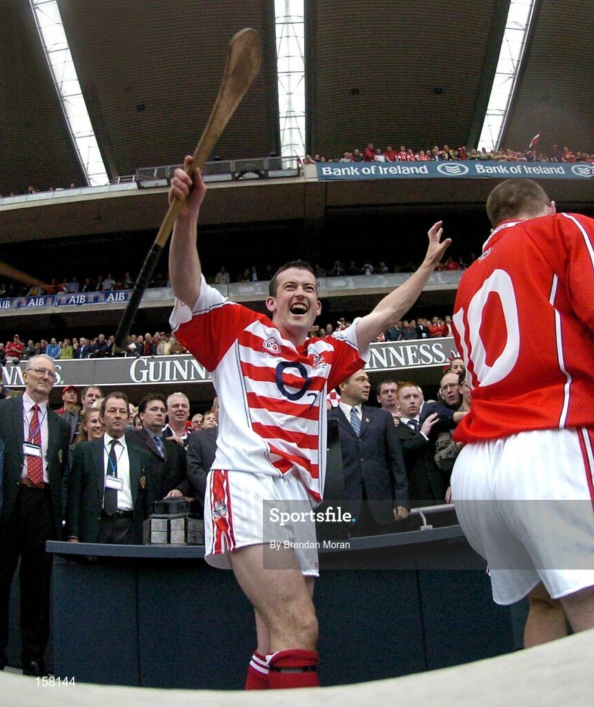 12 September 2004; Cork goalkeeper Donal Og Cusack celebrates after victory over Kilkenny. Guinness All-Ireland Senior Hurling Championship Final, Cork v Kilkenny, Croke Park, Dublin. Picture credit; Brendan Moran / SPORTSFILE *** Local Caption *** Any photograph taken by SPORTSFILE during, or in connection with, the 2004 Guinness All-Ireland Hurling Final which displays GAA logos or contains an image or part of an image of any GAA intellectual property, or, which contains images of a GAA player/players in their playing uniforms, may only be used for editorial and non-advertising purposes.  Use of photographs for advertising, as posters or for purchase separately is strictly prohibited unless prior written approval has been obtained from the Gaelic Athletic Association.