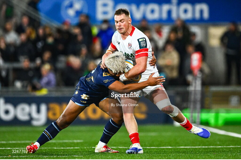 26 September 2025; Harry Sheridan of Ulster is tackled by Fine Inisi of Dragons during the United Rugby Championship match between Ulster and Dragons at Affidea Stadium in Belfast. Photo by Shauna Clinton/Sportsfile