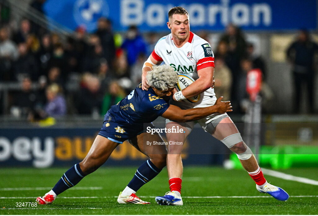 26 September 2025; Harry Sheridan of Ulster is tackled by Fine Inisi of Dragons during the United Rugby Championship match between Ulster and Dragons at Affidea Stadium in Belfast. Photo by Shauna Clinton/Sportsfile