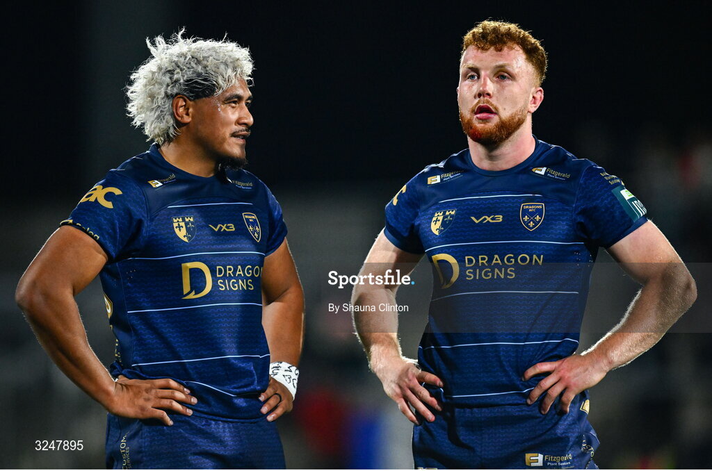 26 September 2025; Aneurin Owen of Dragons, right, and team-mate Fine Inisi after their side's defeat in the United Rugby Championship match between Ulster and Dragons at Affidea Stadium in Belfast. Photo by Shauna Clinton/Sportsfile