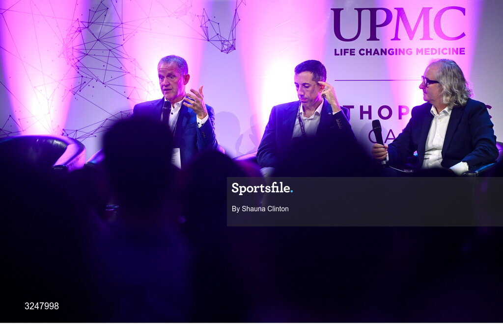 27 September 2025; Attendees, from left, UPMC Concussion Program director Michael Collins PhD, UPMC Concussion Clinical Specialist John Courell and MC Ger Gilroy, Newstalk Radio, during the UPMC Orthopaedic Care and Sports Medicine Conference at The Convention Centre in Dublin. Photo by Shauna Clinton/Sportsfile