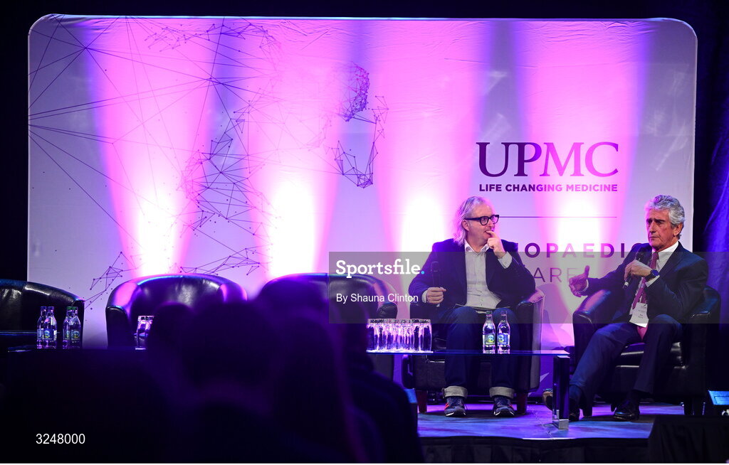 27 September 2025; MC Ger Gilroy, left, speaks with Consultant Orthopaedic Surgeon Ray Moran during the UPMC Orthopaedic Care and Sports Medicine Conference at The Convention Centre in Dublin. Photo by Shauna Clinton/Sportsfile