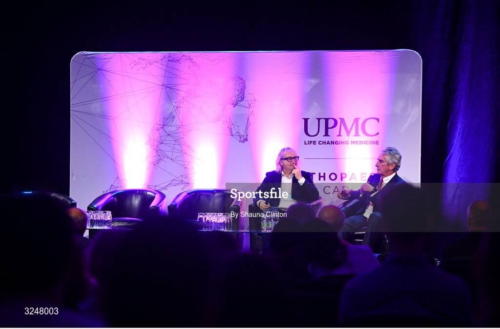 27 September 2025; MC Ger Gilroy, left, speaks with Consultant Orthopaedic Surgeon Ray Moran during the UPMC Orthopaedic Care and Sports Medicine Conference at The Convention Centre in Dublin. Photo by Shauna Clinton/Sportsfile