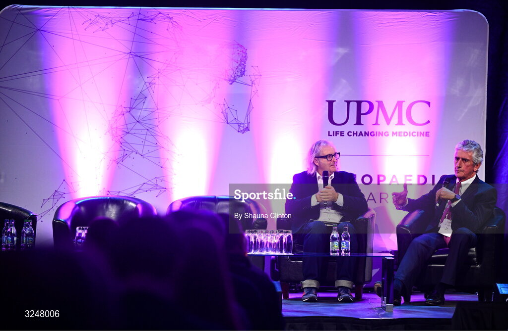 27 September 2025; MC Ger Gilroy, left, speaks with Consultant Orthopaedic Surgeon Ray Moran during the UPMC Orthopaedic Care and Sports Medicine Conference at The Convention Centre in Dublin. Photo by Shauna Clinton/Sportsfile