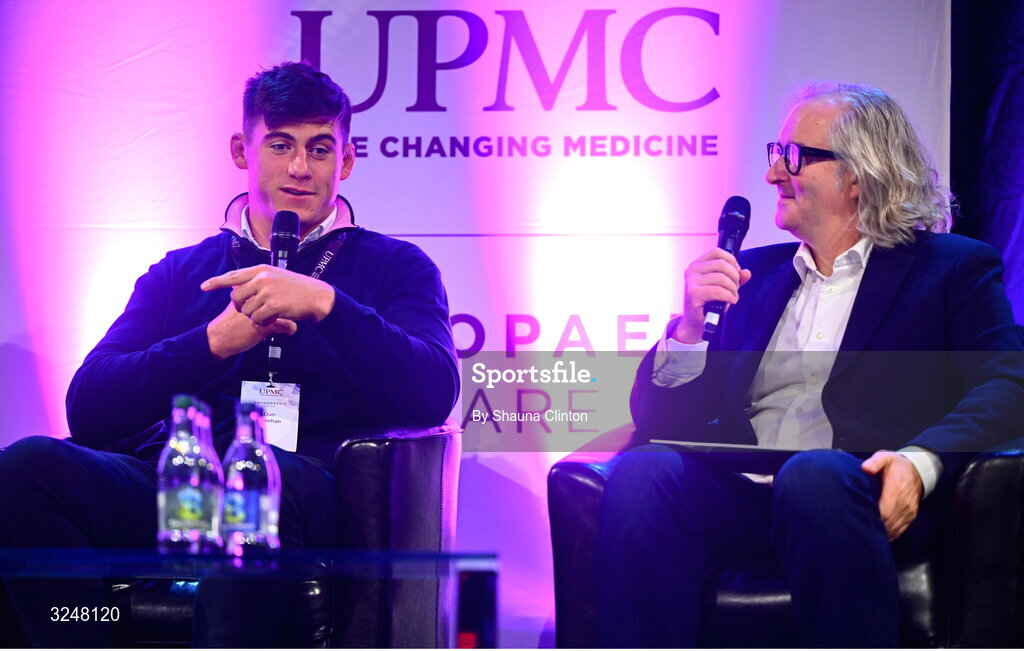 27 September 2025; Irish Rugby international and Leinster player Dan Sheehan, left, and MC Ger Gilroy during the UPMC Orthopaedic Care and Sports Medicine Conference at The Convention Centre in Dublin. Photo by Shauna Clinton/Sportsfile