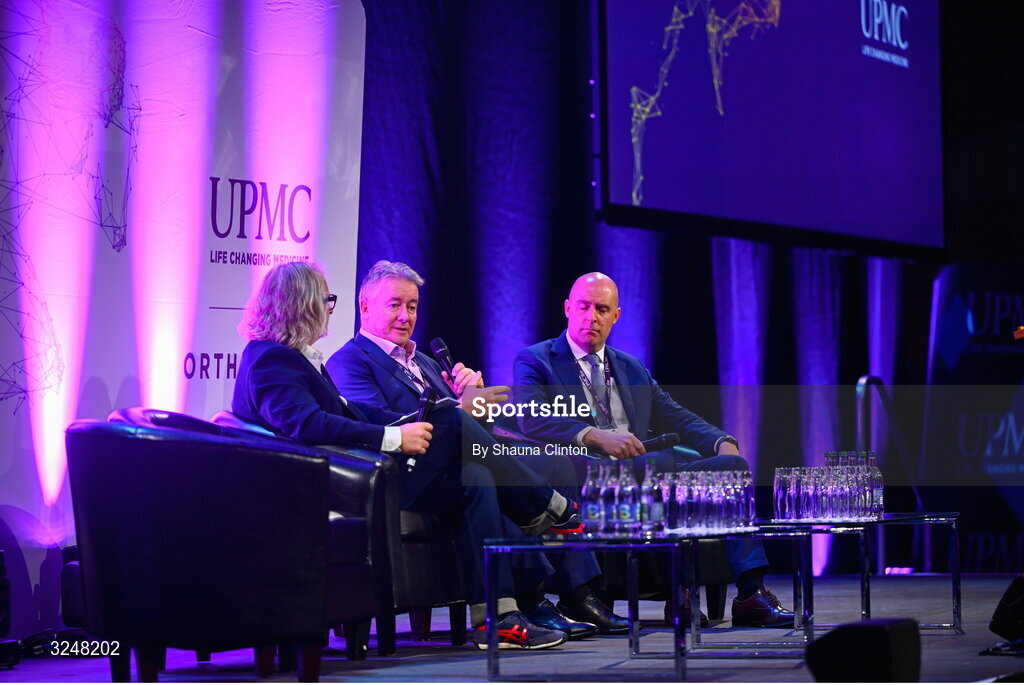 27 September 2025; Attendees, from left, MC Ger Gilroy, UPMC managing director Eamonn Fitzgerald and Whi Insurance DAC managing director Aaron Keogh during the UPMC Orthopaedic Care and Sports Medicine Conference at The Convention Centre in Dublin. Photo by Shauna Clinton/Sportsfile