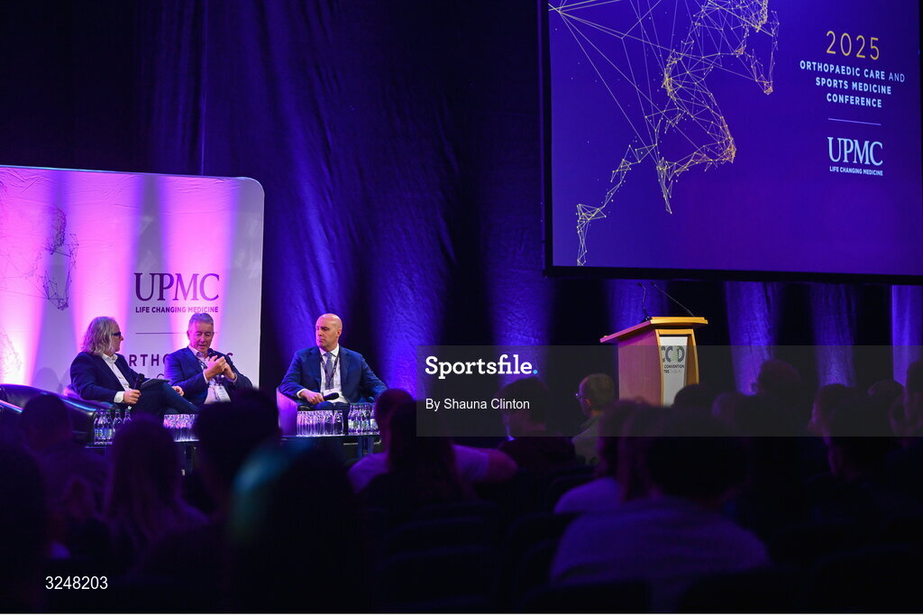 27 September 2025; Attendees, from left, MC Ger Gilroy, UPMC managing director Eamonn Fitzgerald and Whi Insurance DAC managing director Aaron Keogh during the UPMC Orthopaedic Care and Sports Medicine Conference at The Convention Centre in Dublin. Photo by Shauna Clinton/Sportsfile