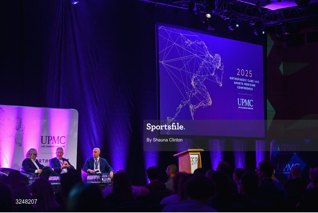 27 September 2025; Attendees, from left, MC Ger Gilroy, UPMC managing director Eamonn Fitzgerald and Whi Insurance DAC managing director Aaron Keogh during the UPMC Orthopaedic Care and Sports Medicine Conference at The Convention Centre in Dublin. Photo by Shauna Clinton/Sportsfile
