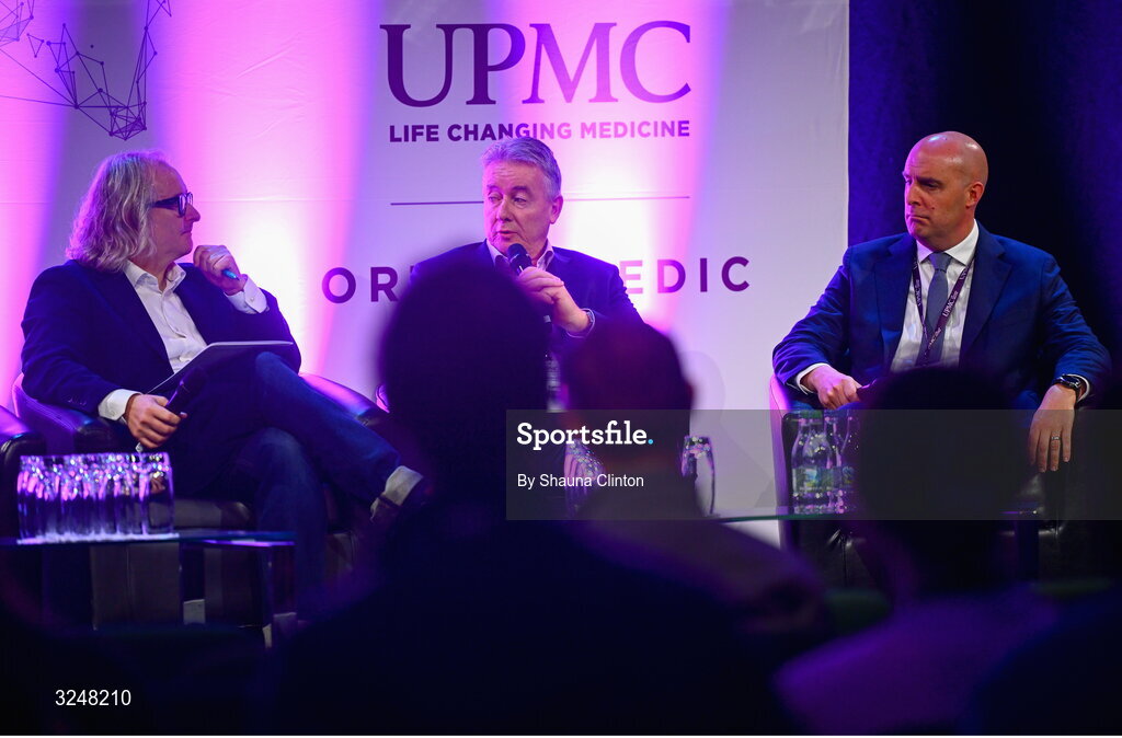 27 September 2025; Attendees, from left, MC Ger Gilroy, UPMC managing director Eamonn Fitzgerald and Whi Insurance DAC managing director Aaron Keogh during the UPMC Orthopaedic Care and Sports Medicine Conference at The Convention Centre in Dublin. Photo by Shauna Clinton/Sportsfile