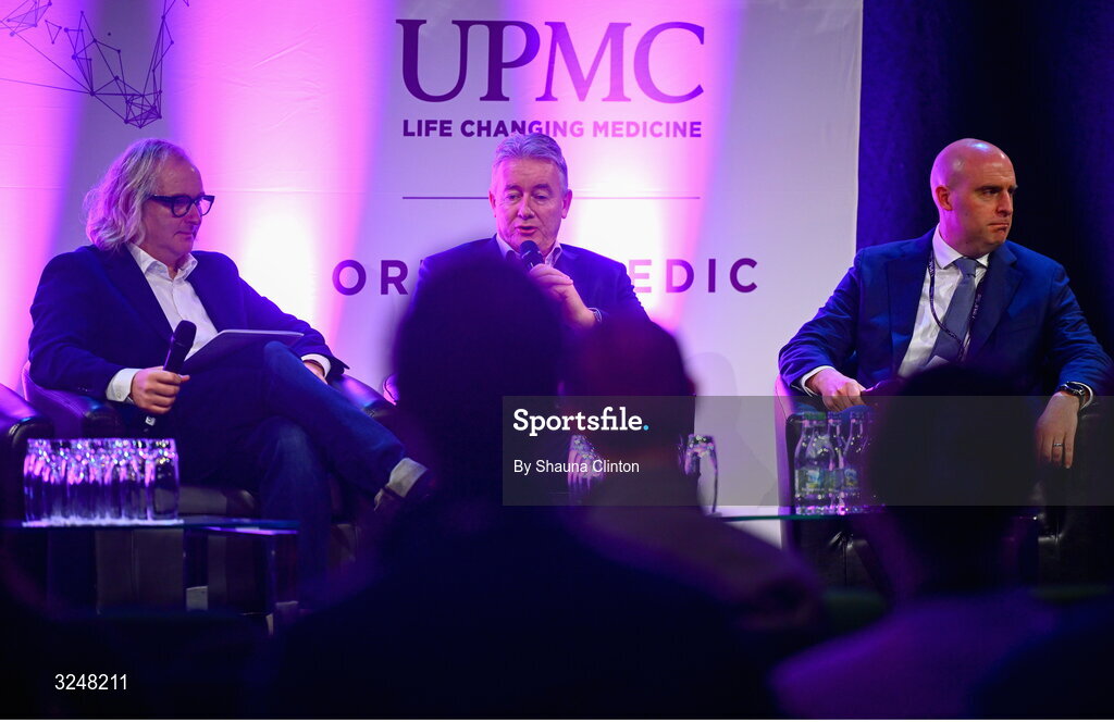 27 September 2025; Attendees, from left, MC Ger Gilroy, UPMC managing director Eamonn Fitzgerald and Whi Insurance DAC managing director Aaron Keogh during the UPMC Orthopaedic Care and Sports Medicine Conference at The Convention Centre in Dublin. Photo by Shauna Clinton/Sportsfile