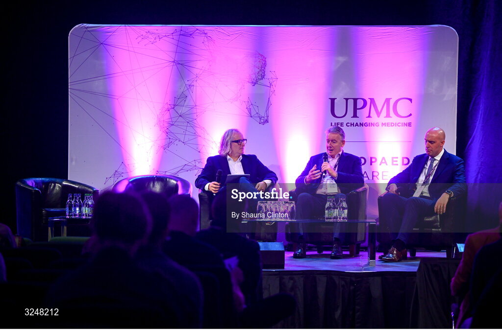 27 September 2025; Attendees, from left, MC Ger Gilroy, UPMC managing director Eamonn Fitzgerald and Whi Insurance DAC managing director Aaron Keogh during the UPMC Orthopaedic Care and Sports Medicine Conference at The Convention Centre in Dublin. Photo by Shauna Clinton/Sportsfile