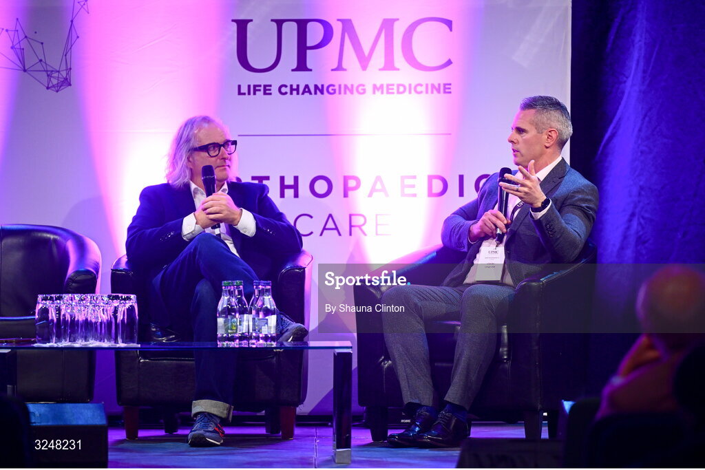27 September 2025; MC Ger Gilroy of Newstalk Radio, left, and UPMC Sports Medicine and Institute for Health director Ciaran Cosgrave during the UPMC Orthopaedic Care and Sports Medicine Conference at The Convention Centre in Dublin. Photo by Shauna Clinton/Sportsfile